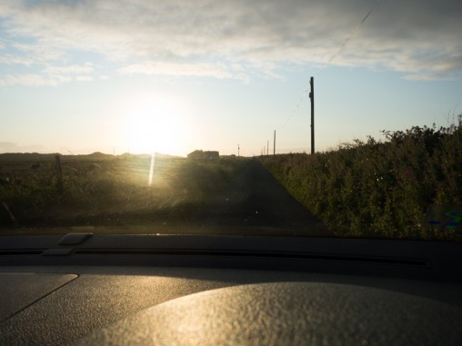 photograph through the windshield, sun set